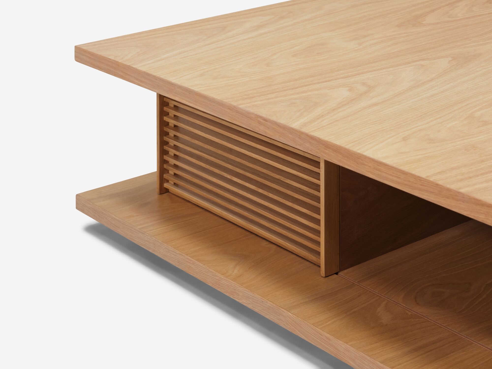 Detail view of the Plank modern square coffee table in oak with slats