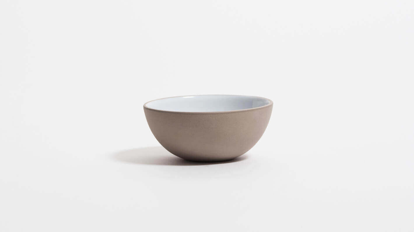 Front view of grey and white small stoneware bowl