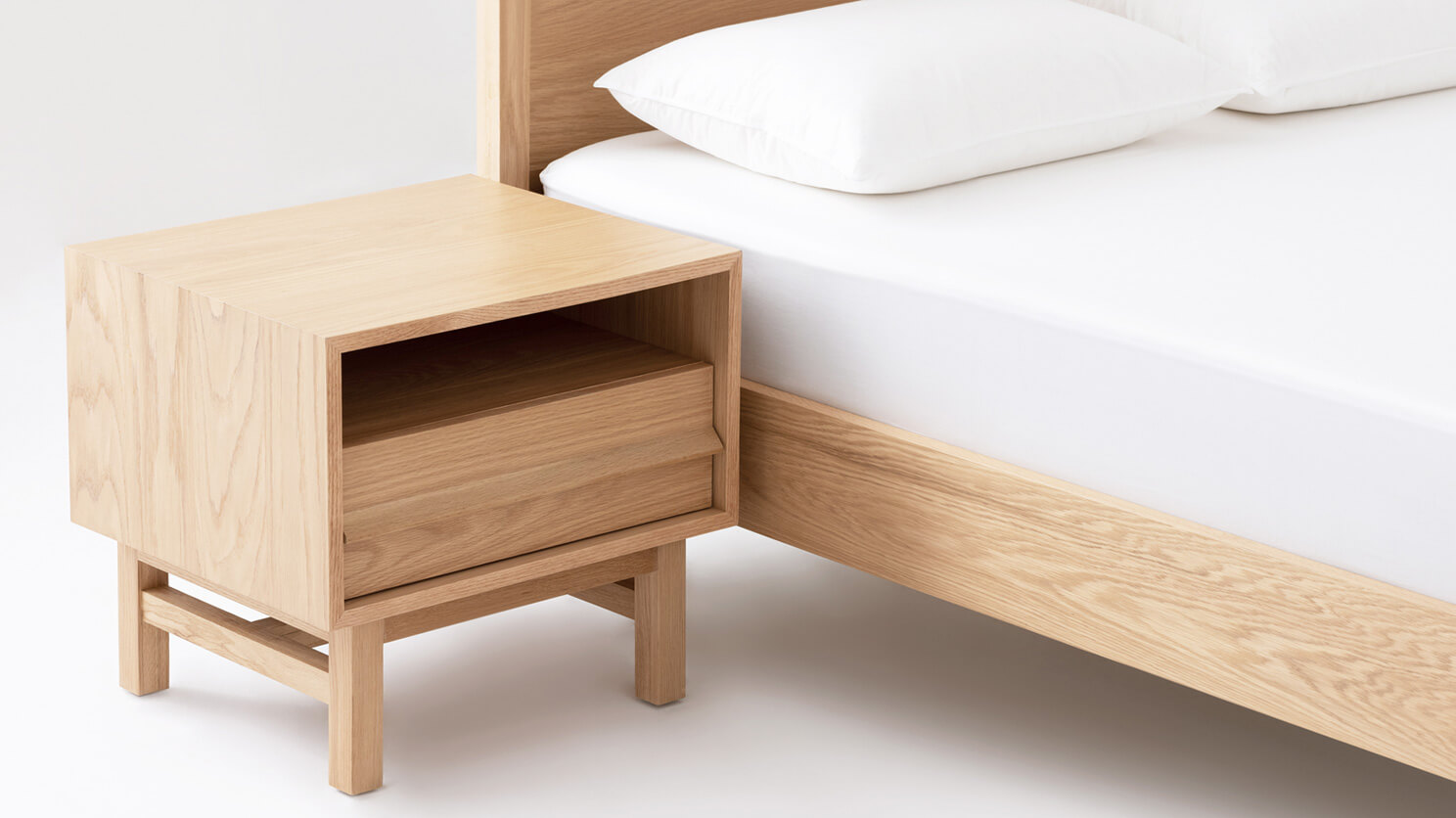 The Marcel open shelf modern nightstand in oak with matching bed frame