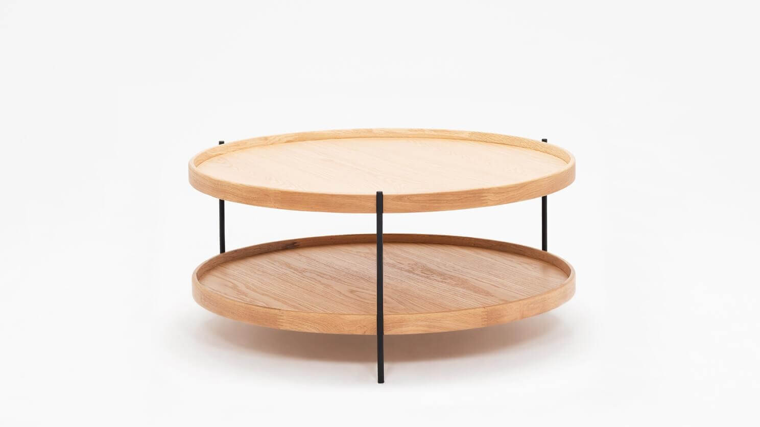 Front view of the small Sage round coffee table in oak