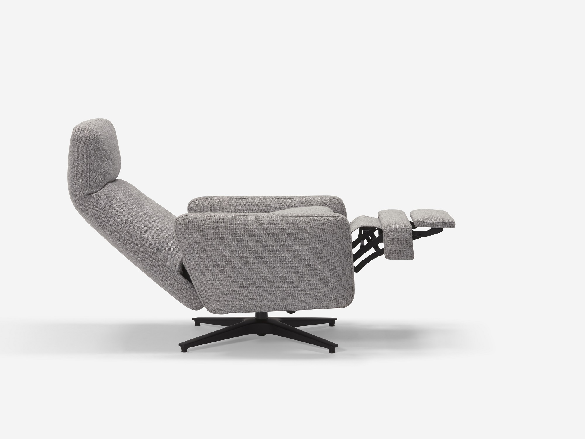 Side view of grey fabric reclining chair with seat reclined