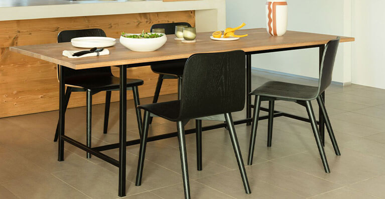 a large oak table is shown in a dining room setting. Link to Kendall dining sale